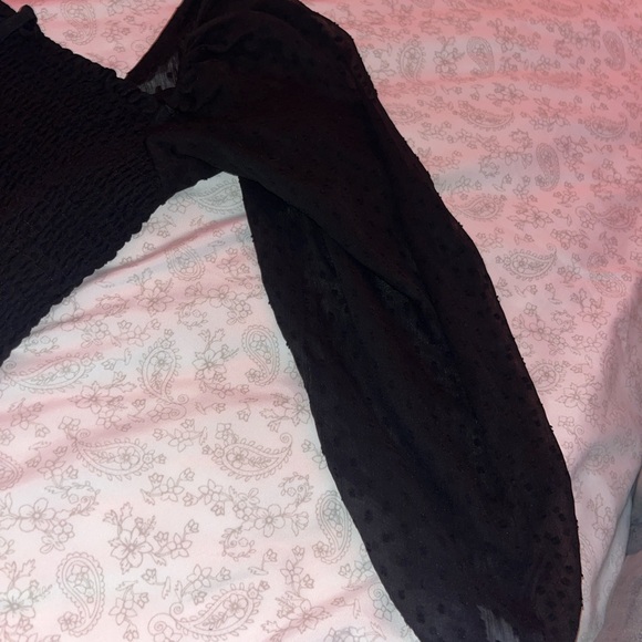 Black crop top. Very soft and had bubble sleeves that are see throught. - Picture 6 of 7